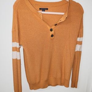 Orange sweater with buttons!